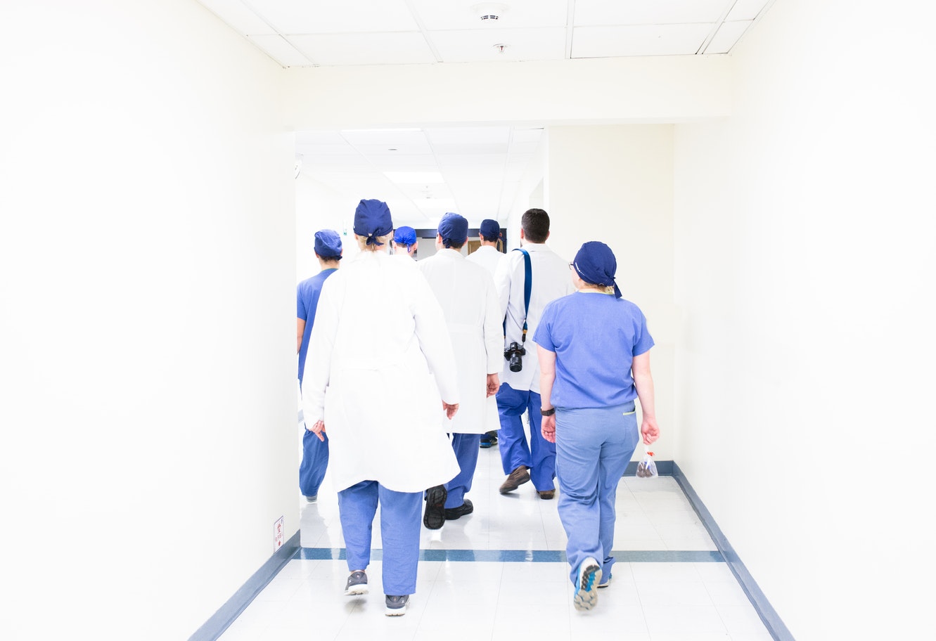 Doctors walking down hallway