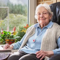 Older lady sittinh in armchair